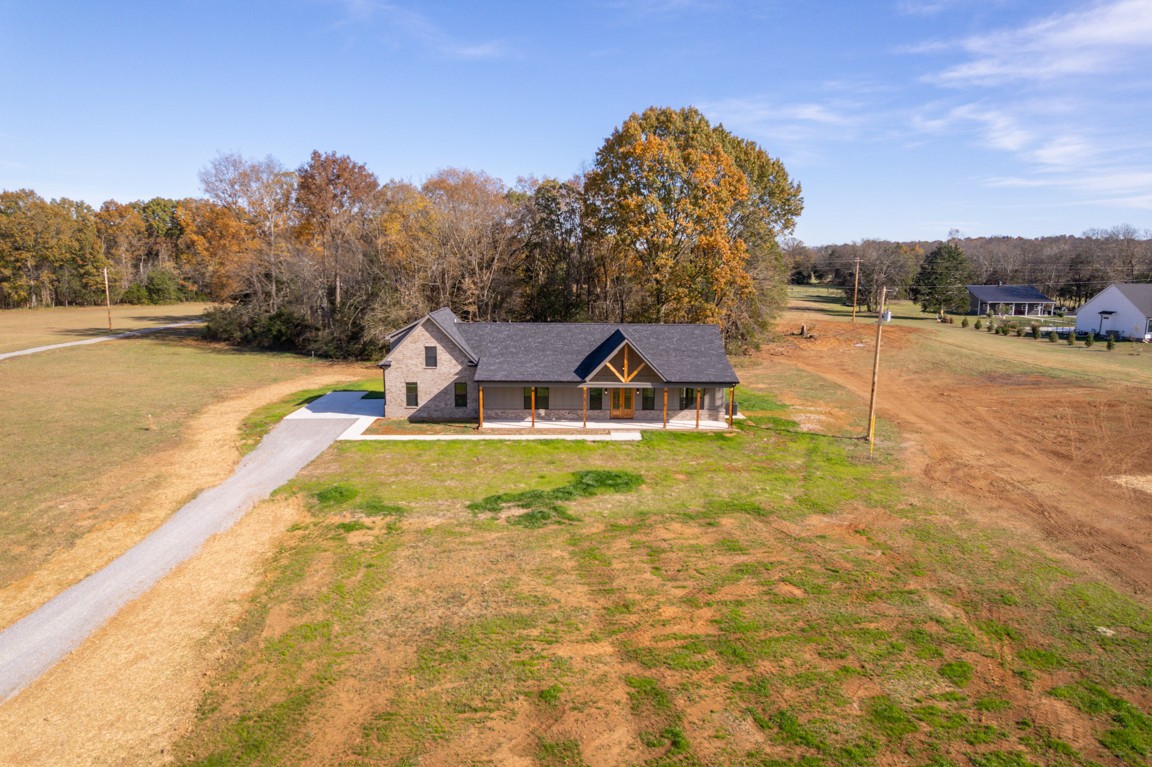 2309 Hunter Road Lewisburg, TN 37091 - Photo 3 of 27 a view of a swimming pool with a lake view