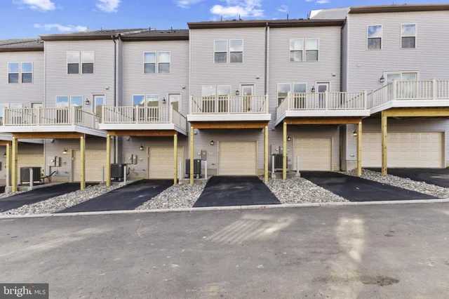 a view of a building with a street