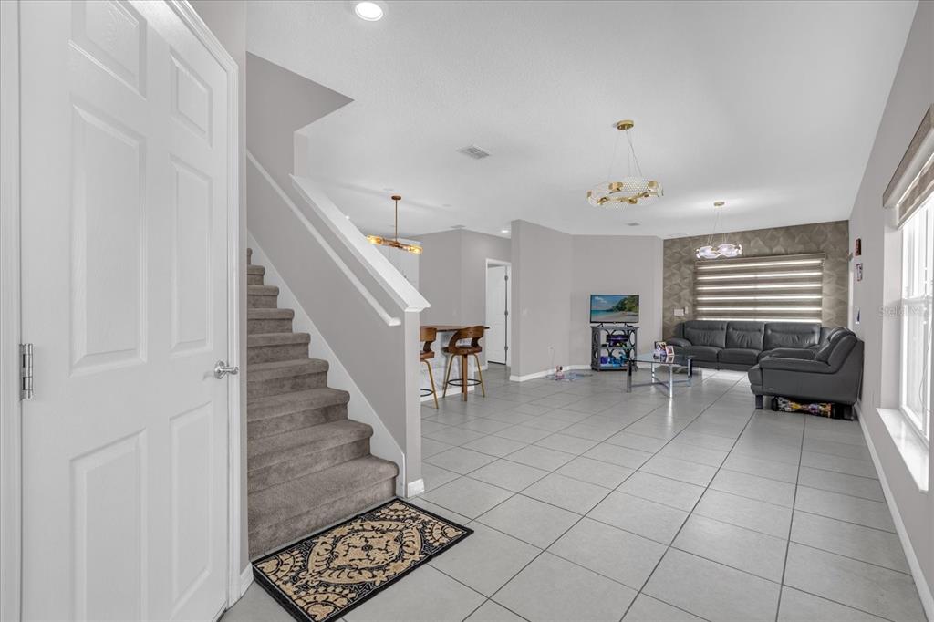 3470 Beau Road Kissimmee, FL 34746 - Photo 5 of 40 a view of entryway with livingroom