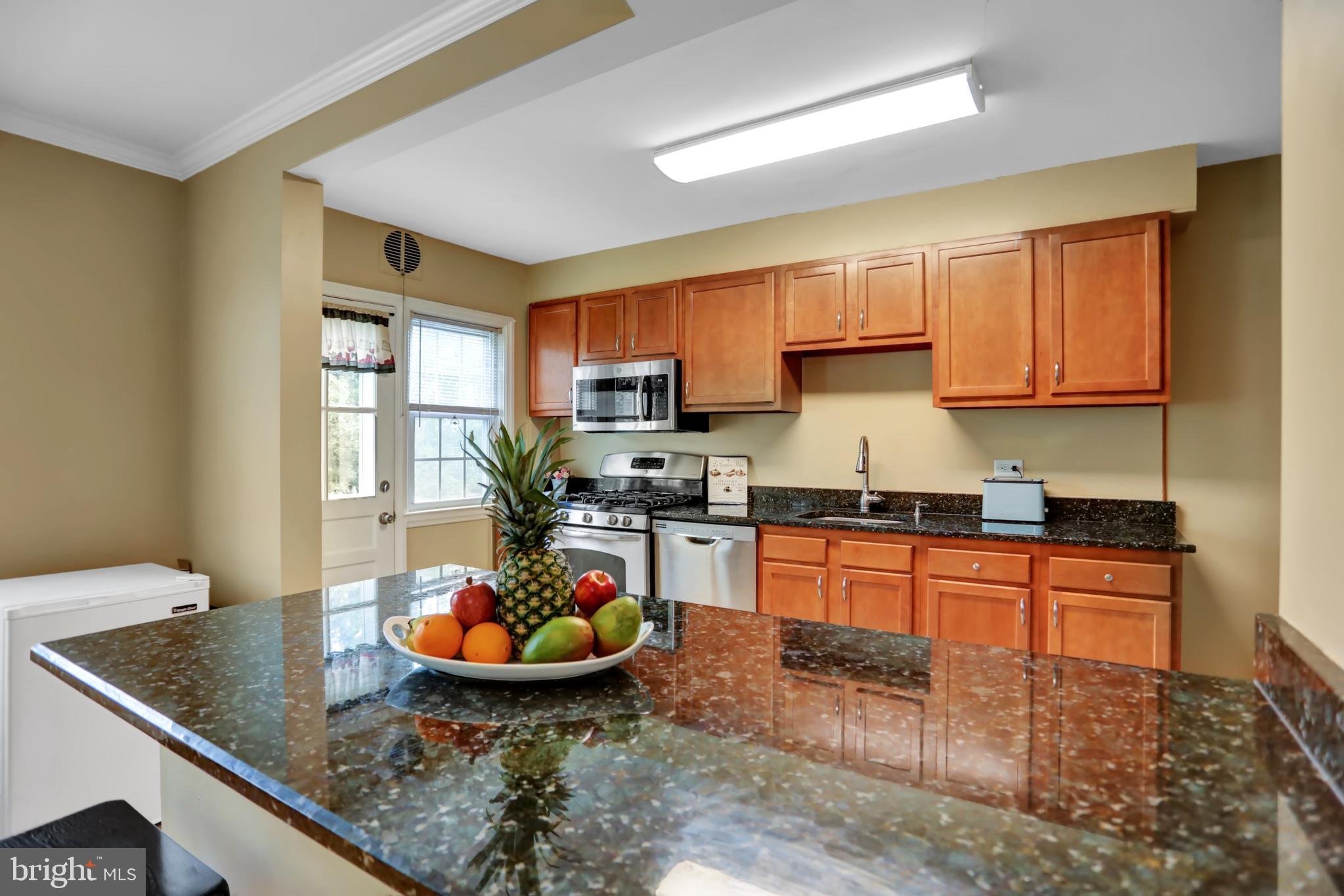 416 Overbrook Road Baltimore, MD 21212 - Photo 11 of 41 Kitchen open to dining room