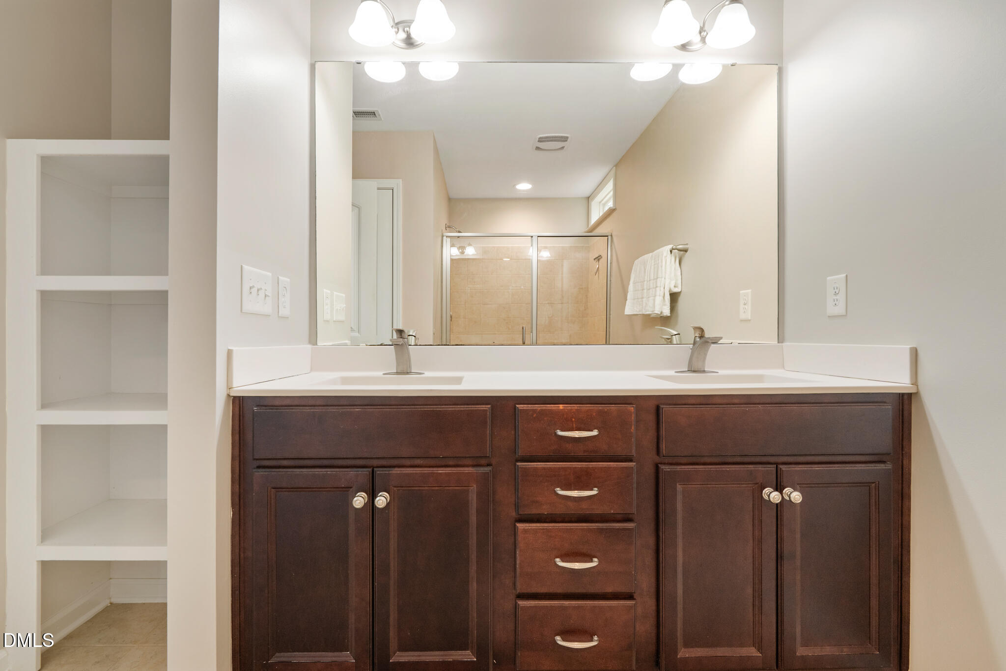 5500 Nur Lane Raleigh, NC 27606 - Photo 6 of 36 Primary Bath Dual sinks and shelving