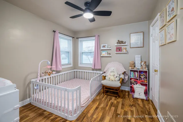 a bedroom with furniture and a window