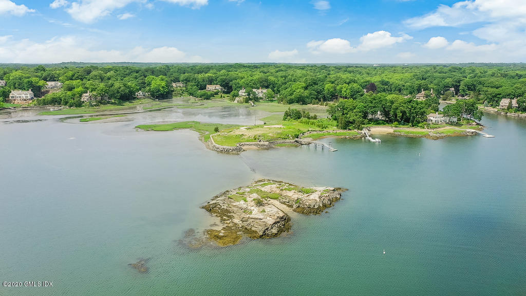 122 Delafield Island Road Darien, CT 06820 - Photo 23 of 34 a view of a lake from a balcony