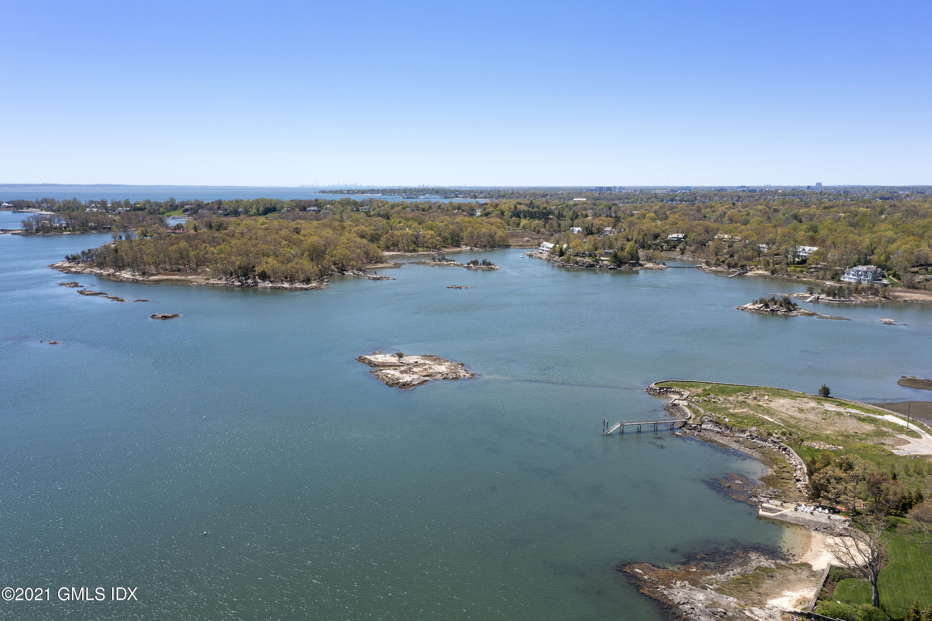 122 Delafield Island Road Darien, CT 06820 - Photo 32 of 34 an aerial view of a house with a lake view