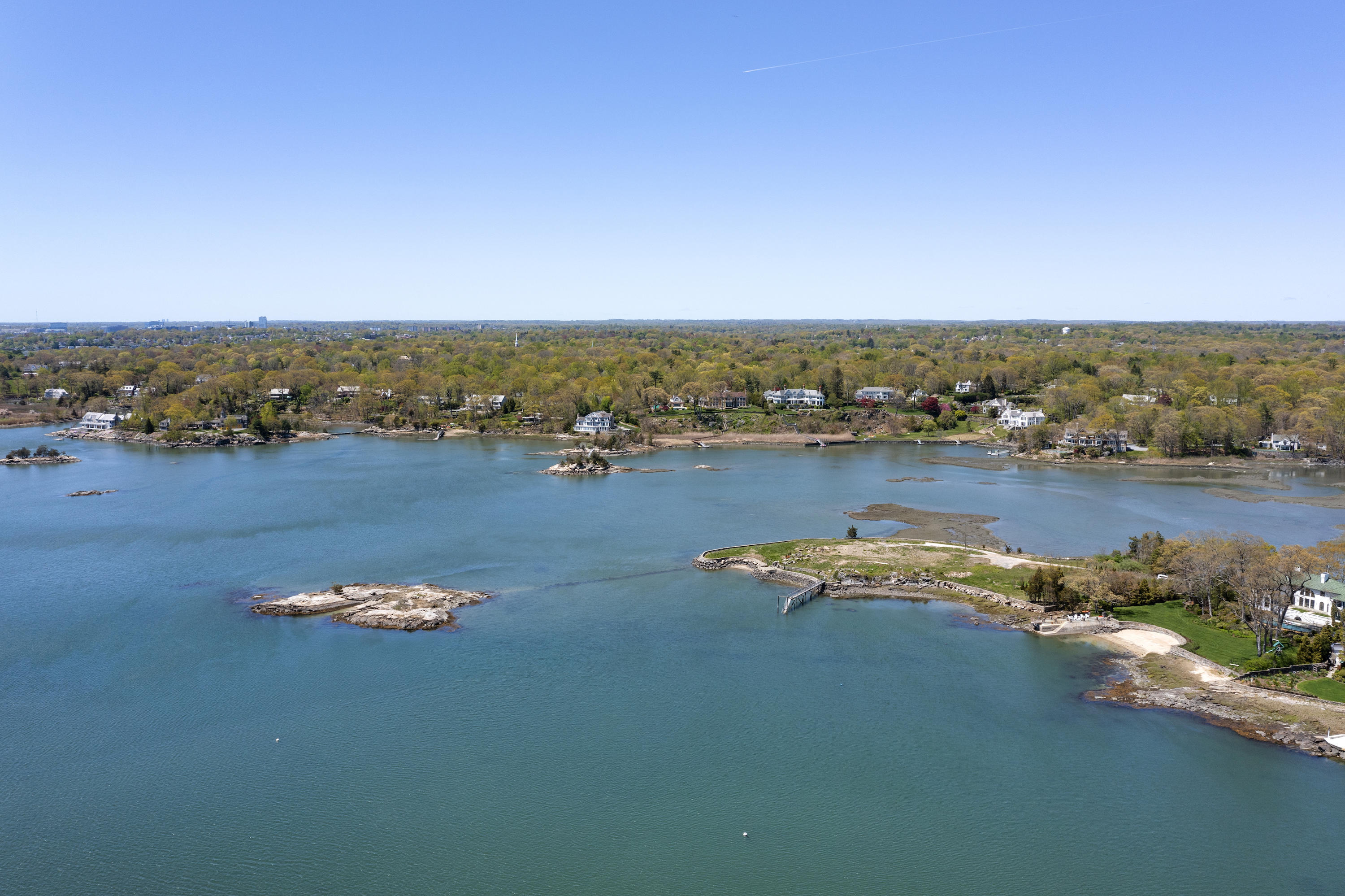 122 Delafield Island Road Darien, CT 06820 - Photo 9 of 34 a view of a lake with a city