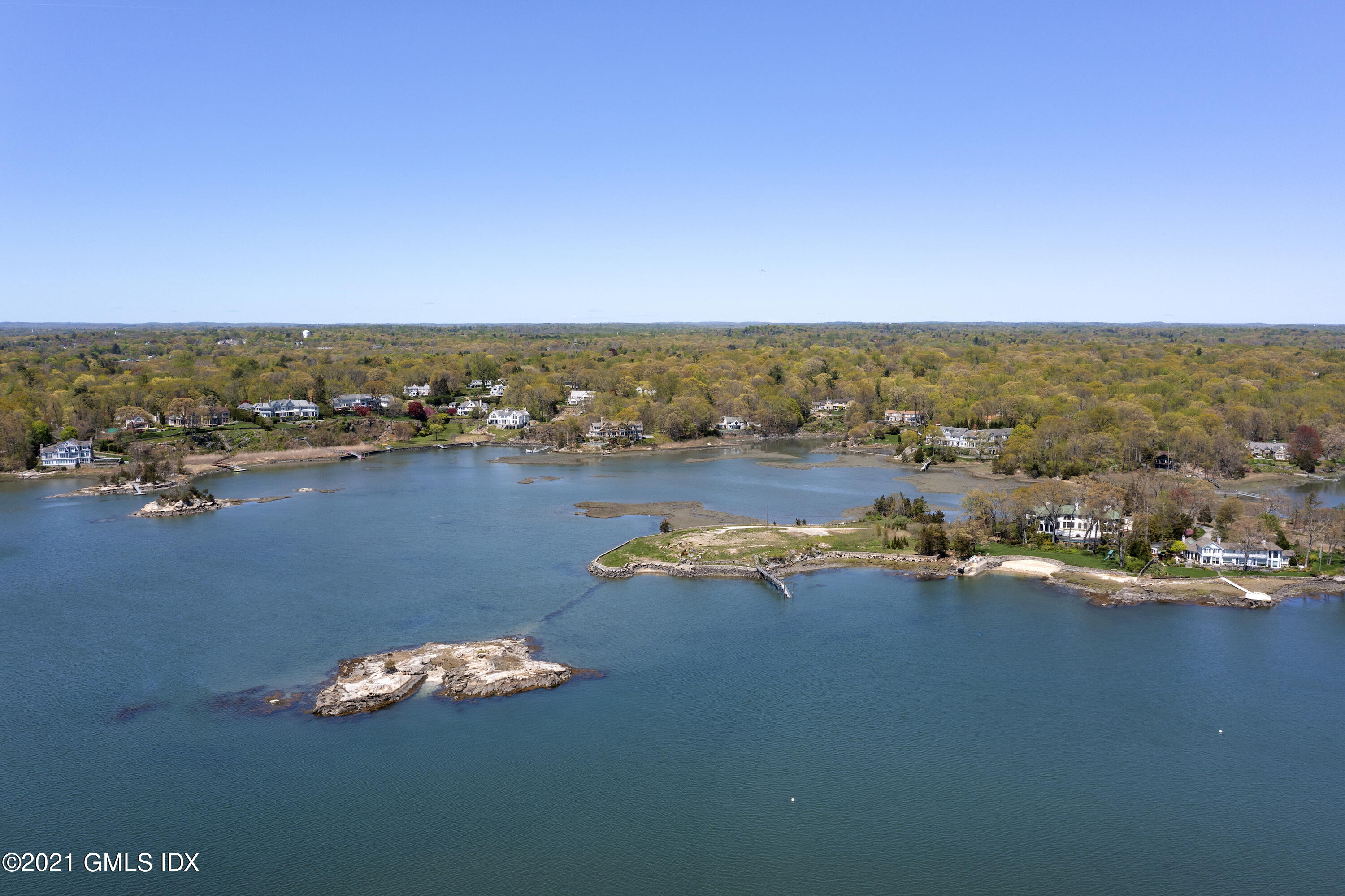 122 Delafield Island Road Darien, CT 06820 - Photo 10 of 34 an aerial view of a houses with a lake view