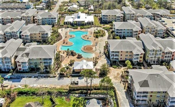 8700 Front Beach Road, Unit 2107 Panama City Beach, FL 32407 - Photo 1 of 1 an aerial view of residential houses with outdoor space
