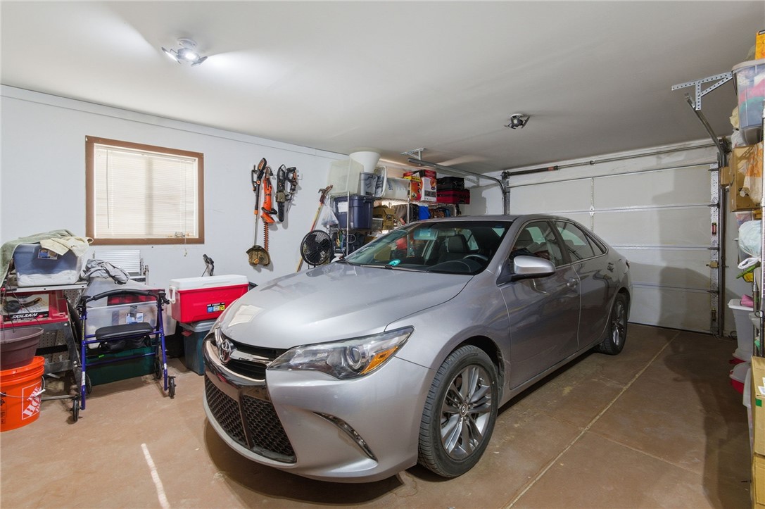 4342 Cordes Road Golden Valley, AZ 86413 - Photo 39 of 39 a car parked in a garage