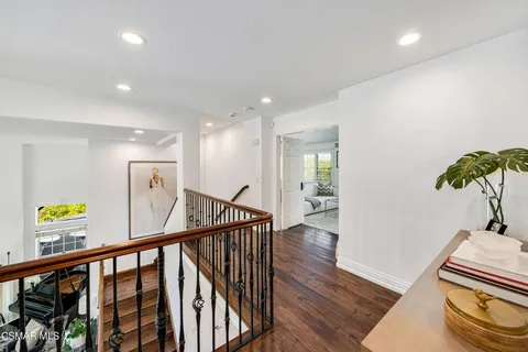 a bed room with a bed and a large window