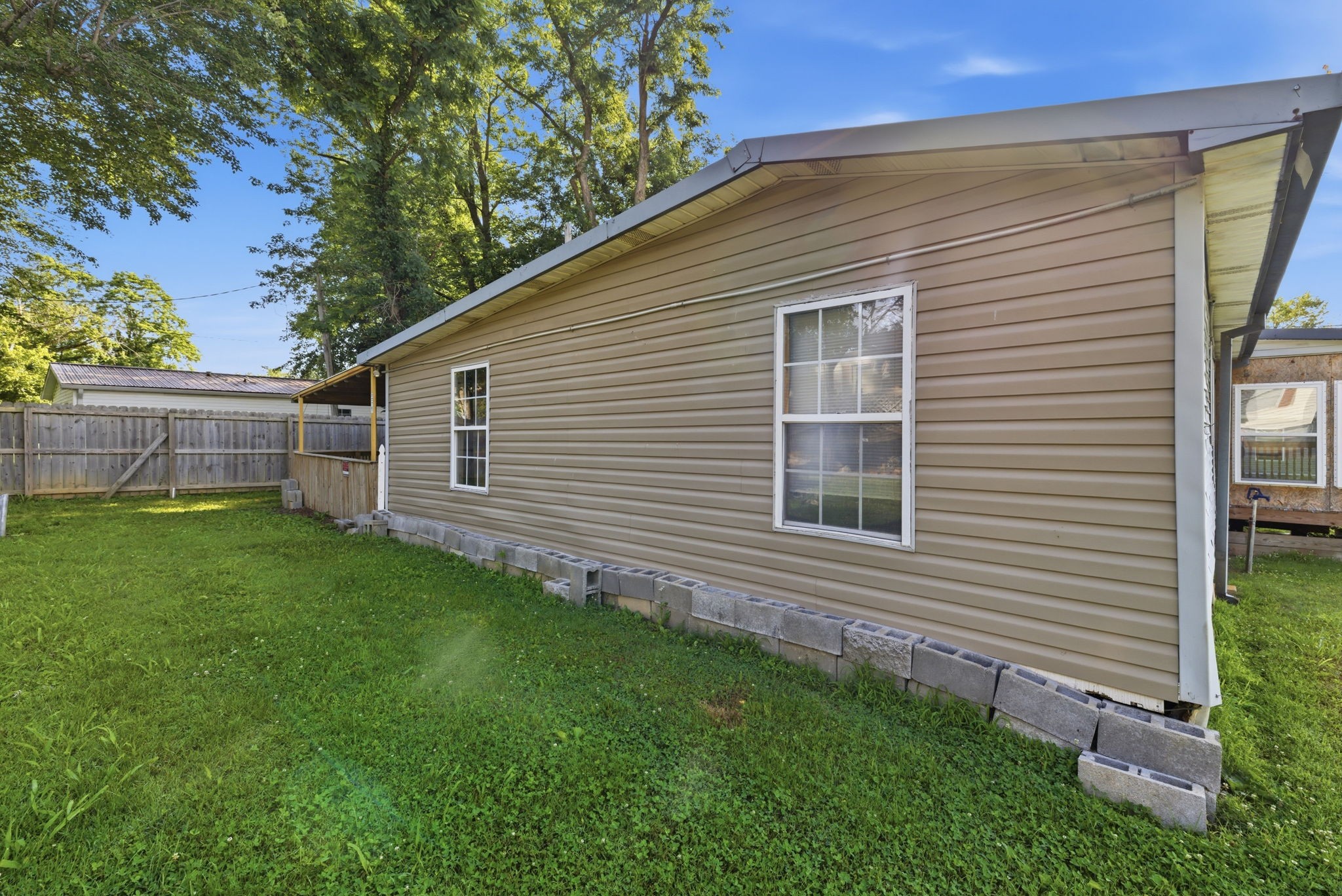 207 Center Street Portland, TN 37148 - Photo 24 of 26 a view of a house with a backyard