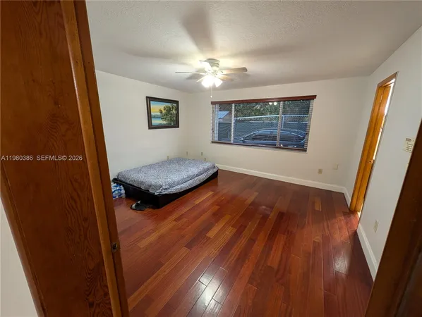 a view of entryway with wooden floor