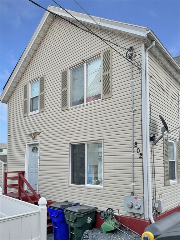 802 2nd Street Fall River, MA 02721 - Photo 1 of 12 a view of a house with a chairs in a patio