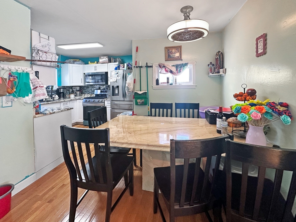 802 2nd Street Fall River, MA 02721 - Photo 6 of 12 a view of a dining room with furniture and chandelier