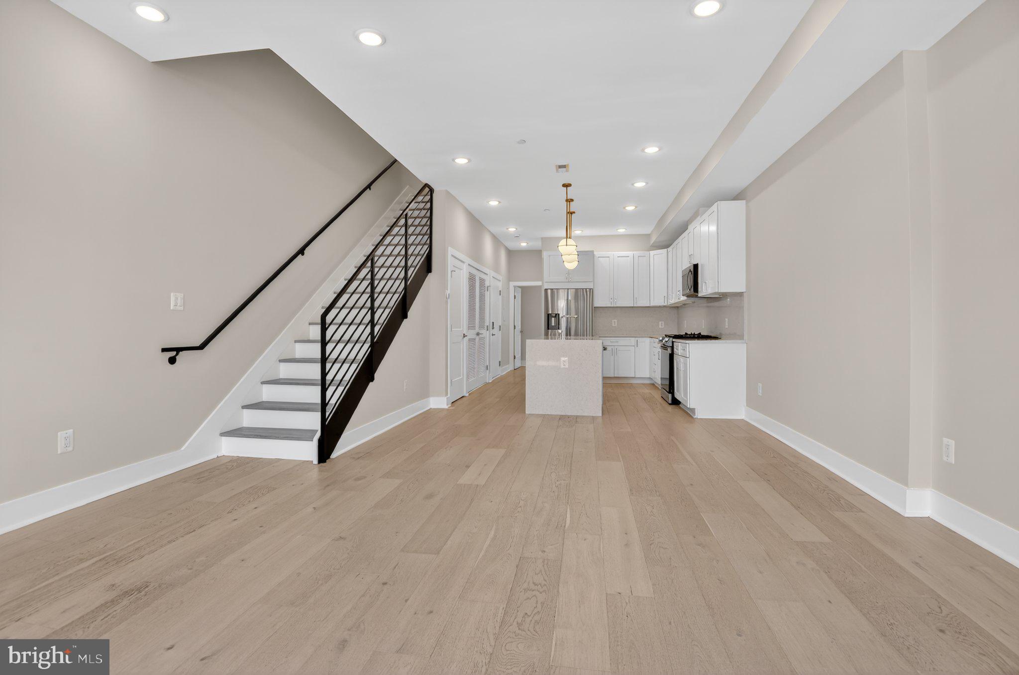 217 20th Street Northeast, Unit 2 Washington, DC 20002 - Photo 3 of 17 Modern elegance in open living space.