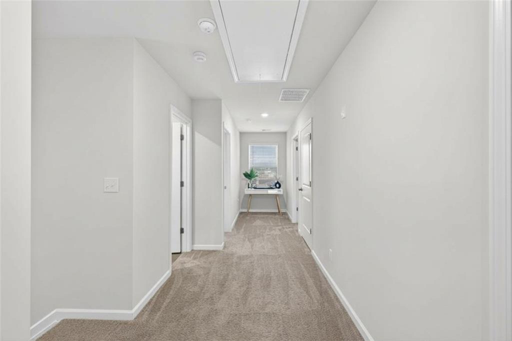 480 Overlook Road Covington, GA 30014 - Photo 15 of 20 a view of a hallway with wooden floor