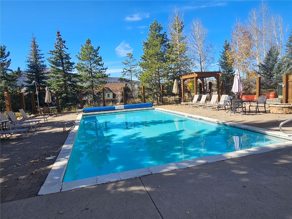 1945 Cornice Road, Unit 2431 Steamboat Springs, CO 80487 - Photo 16 of 24 a view of a yard with plants and trees