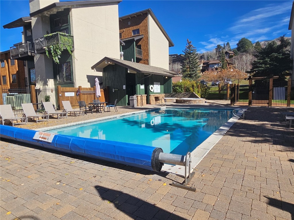 1945 Cornice Road, Unit 2431 Steamboat Springs, CO 80487 - Photo 17 of 24 a house view with a sitting space and garden space