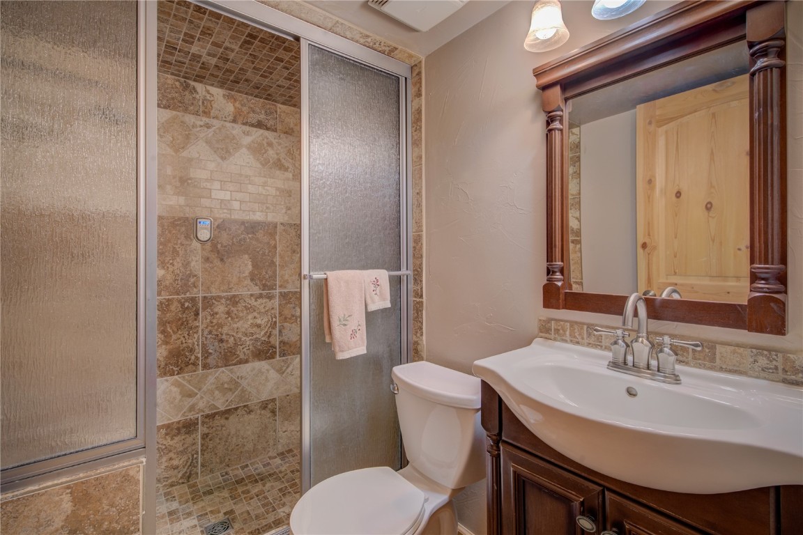 1945 Cornice Road, Unit 2431 Steamboat Springs, CO 80487 - Photo 9 of 24 a bathroom with a sink toilet and shower
