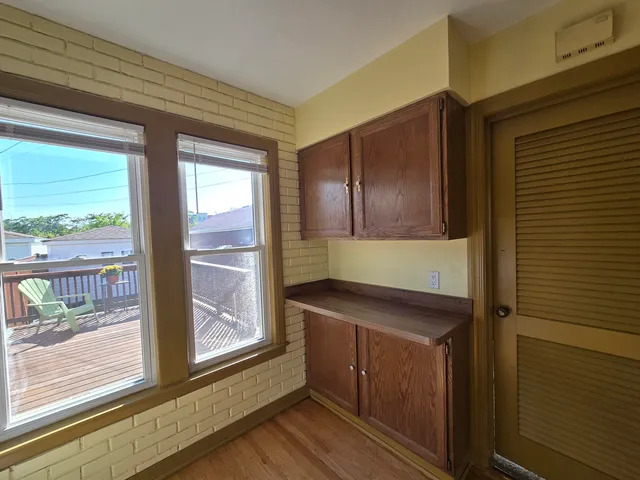 a kitchen that has a sink and a window