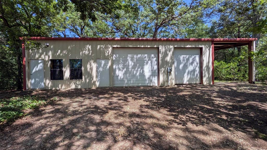 7451 County Road 1509 Athens, TX 75751 - Photo 30 of 36 a front view of a house