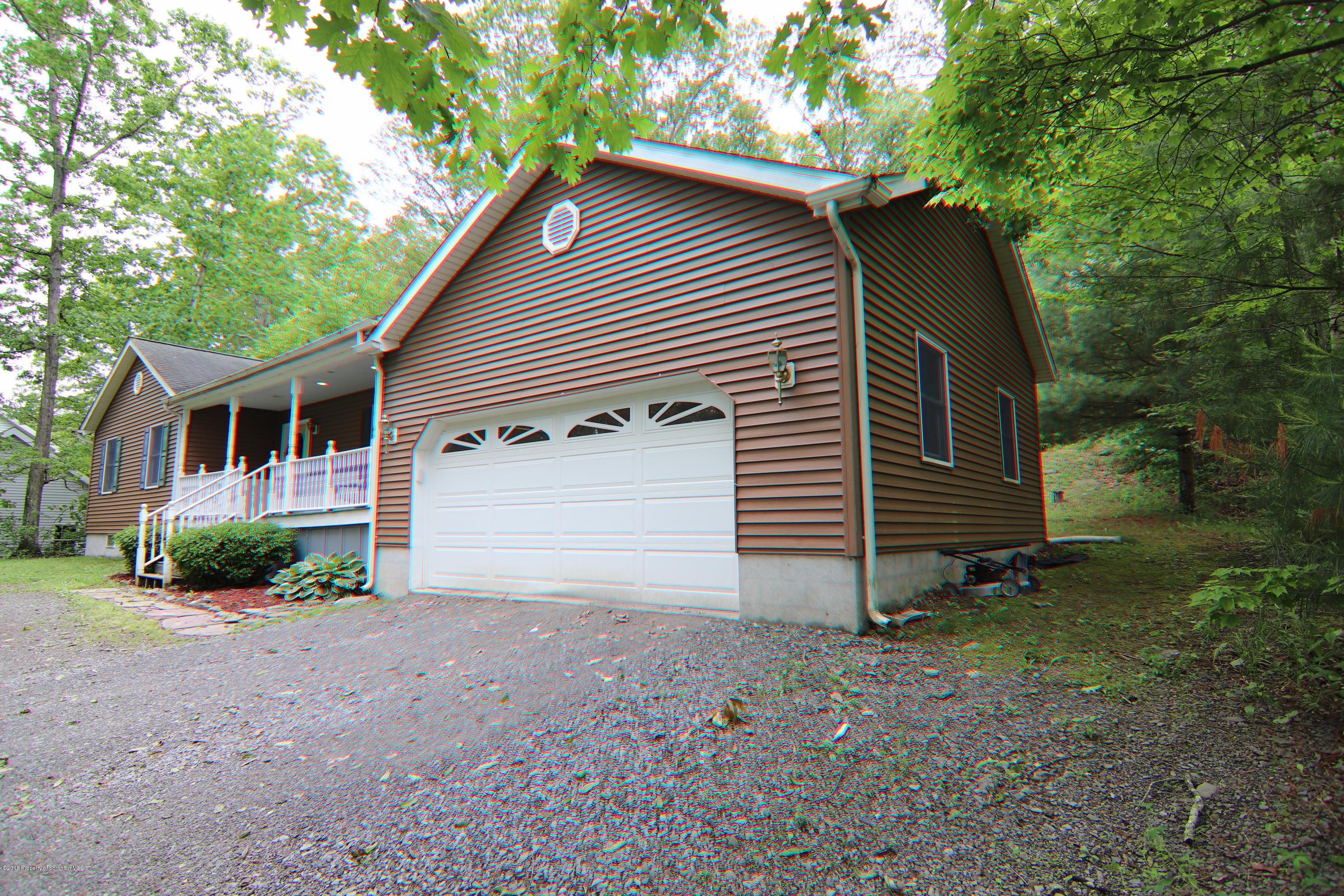 255 Billings Mill Road Tunkhannock, PA 18657 - Photo 3 of 47 a view of a house with a yard and garage