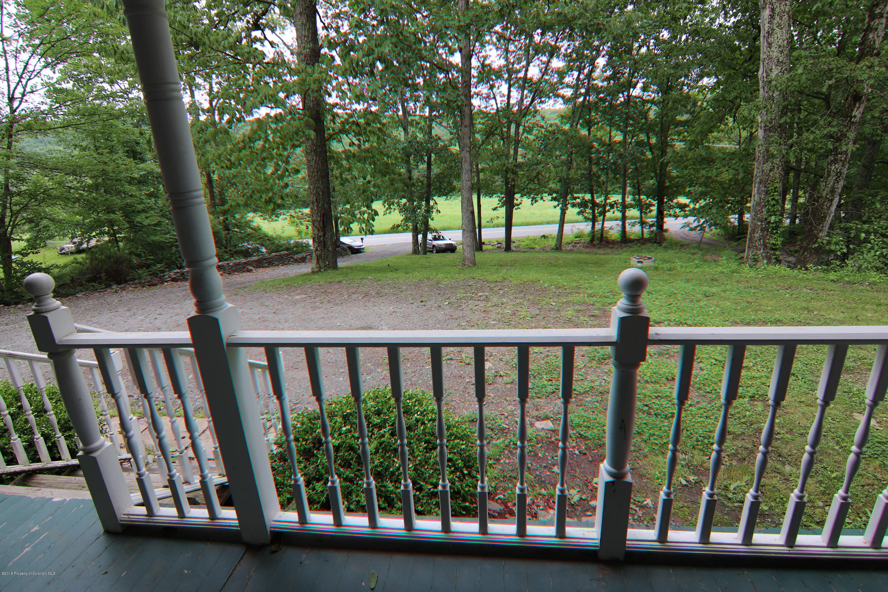 255 Billings Mill Road Tunkhannock, PA 18657 - Photo 44 of 47 a view of yard from deck having patio
