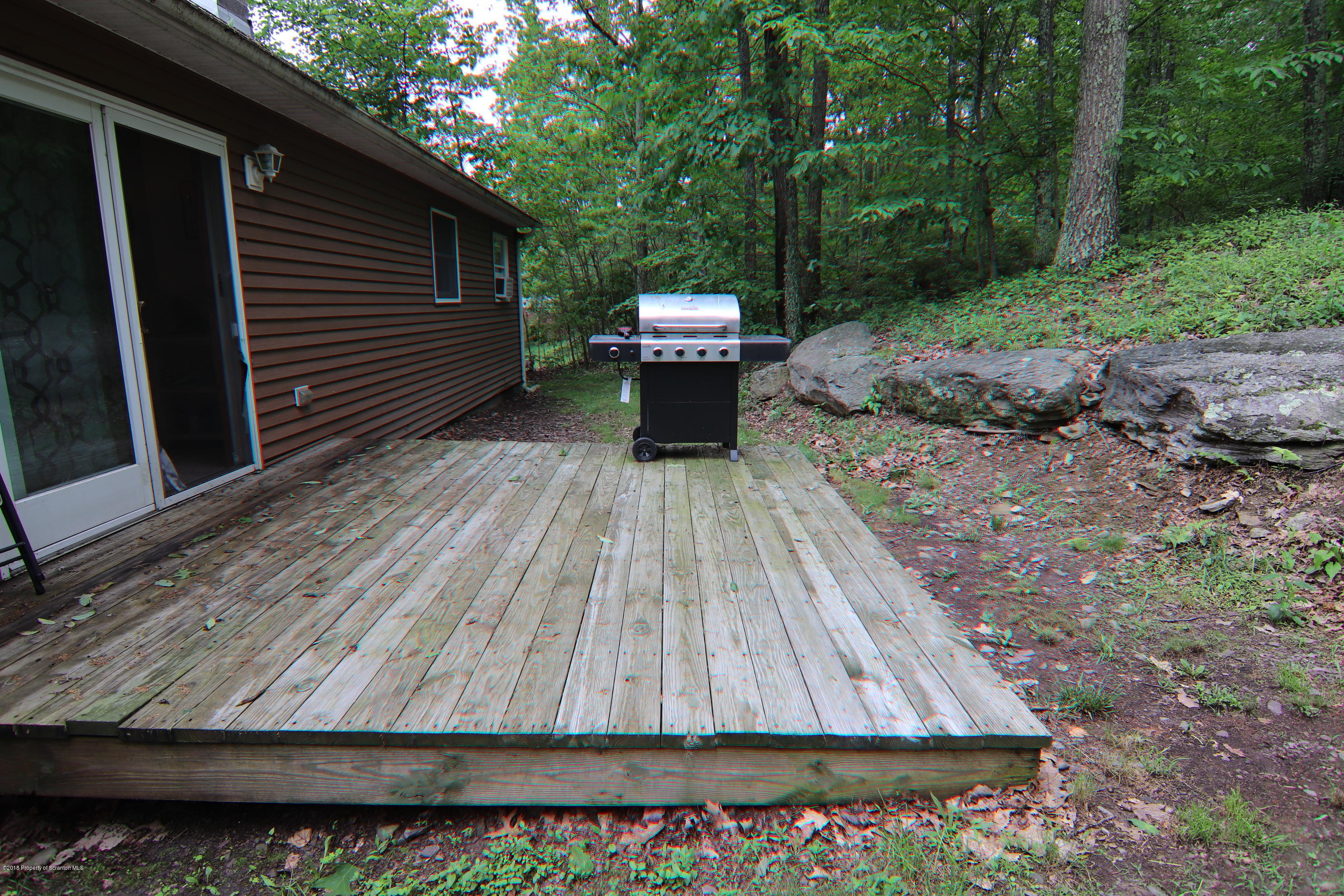 255 Billings Mill Road Tunkhannock, PA 18657 - Photo 7 of 47 a backyard of a house