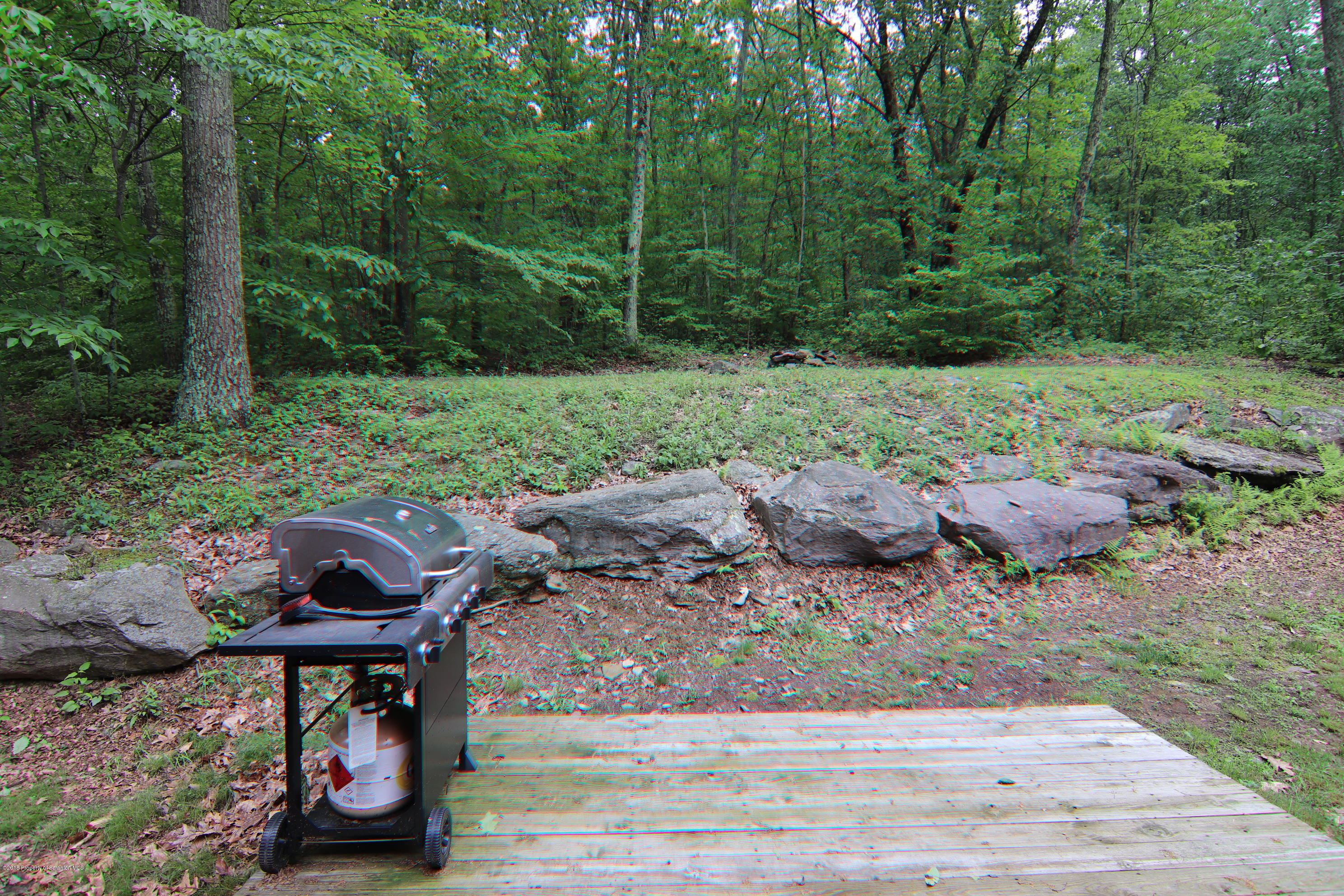 255 Billings Mill Road Tunkhannock, PA 18657 - Photo 8 of 47 a view of a patio in backyard