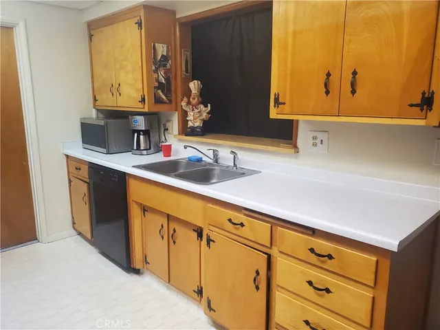 a bathroom with a sink vanity and mirror