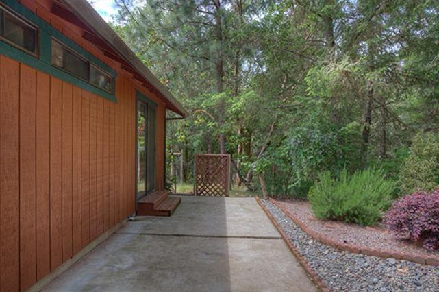 7192 Lower River Road Grants Pass, OR 97526 - Photo 14 of 30 a view of backyard with green space