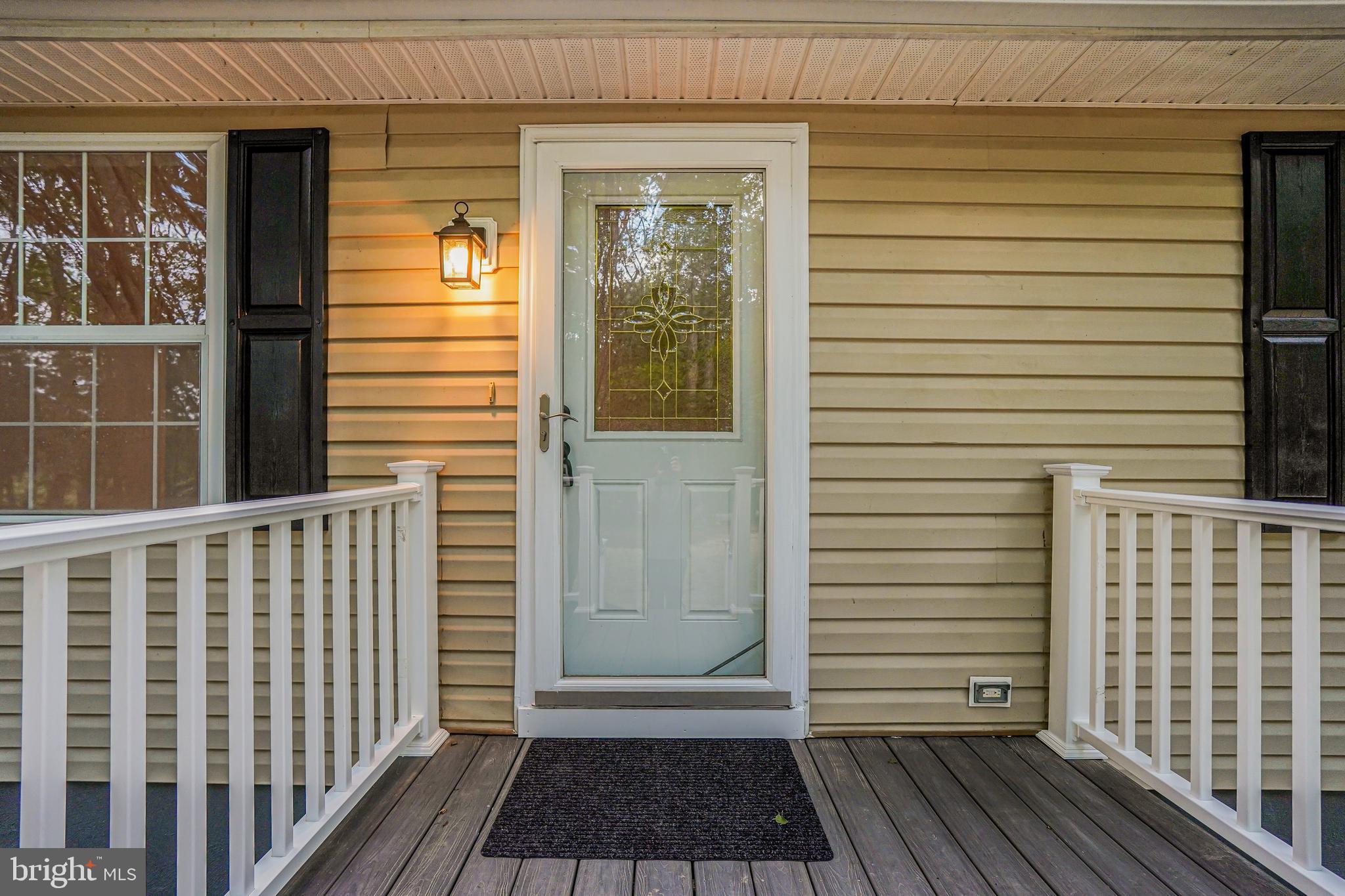 767 Loving Road Zion Crossroads, VA 22942 - Photo 31 of 33 a view of a porch with wooden floor