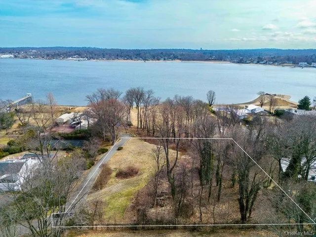 a view of a lake from a balcony