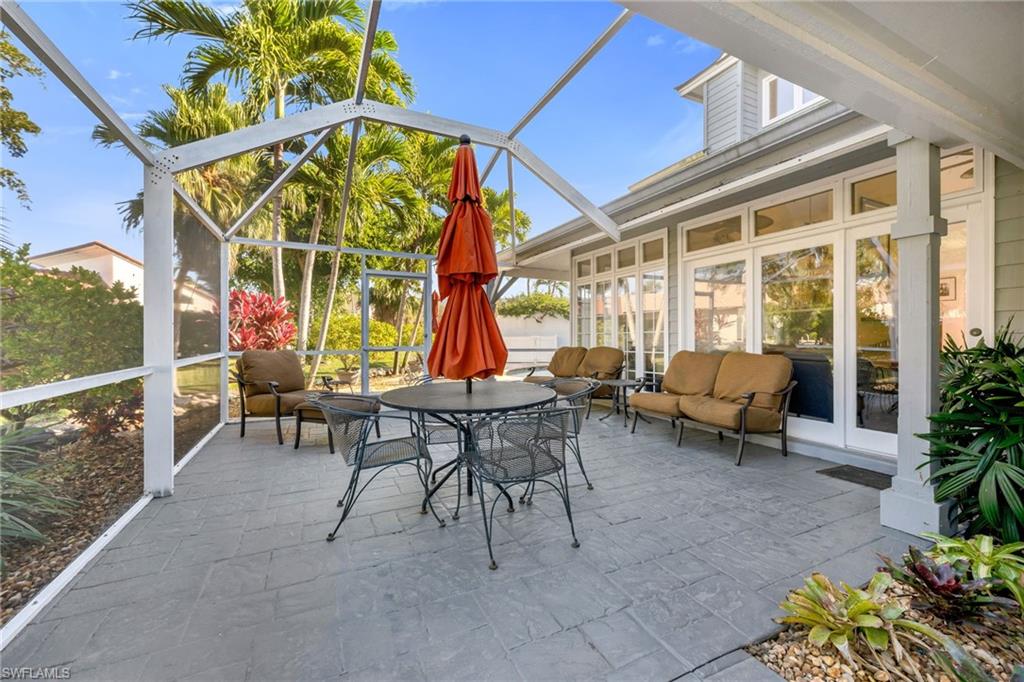 667 Bridge Way Lane Naples, FL 34108 - Photo 16 of 18 a view of outdoor space yard and patio
