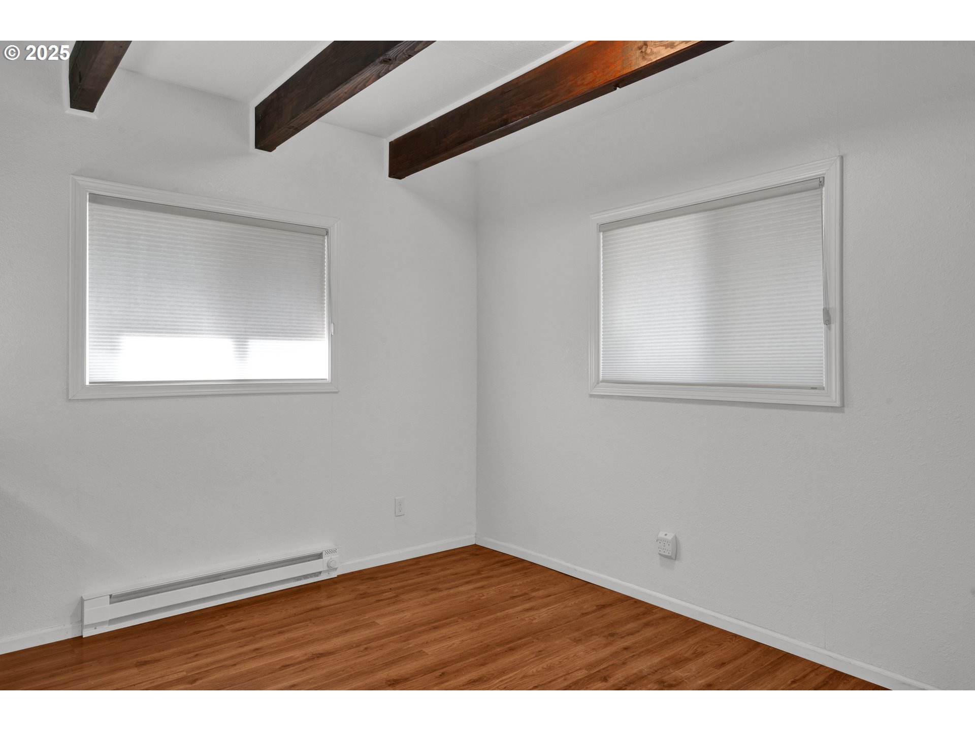 5603 Friendly Acres Road Florence, OR 97439 - Photo 21 of 45 an empty room with a window