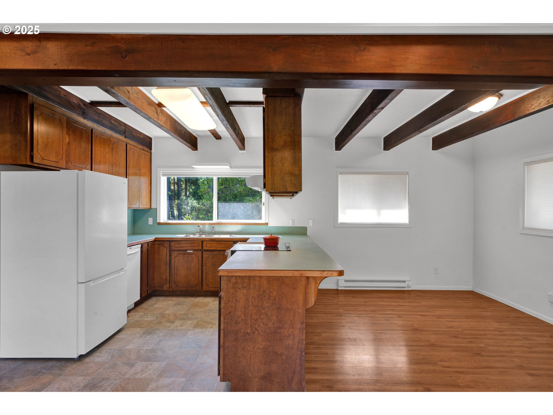 5603 Friendly Acres Road Florence, OR 97439 - Photo 23 of 45 a room with window and washer