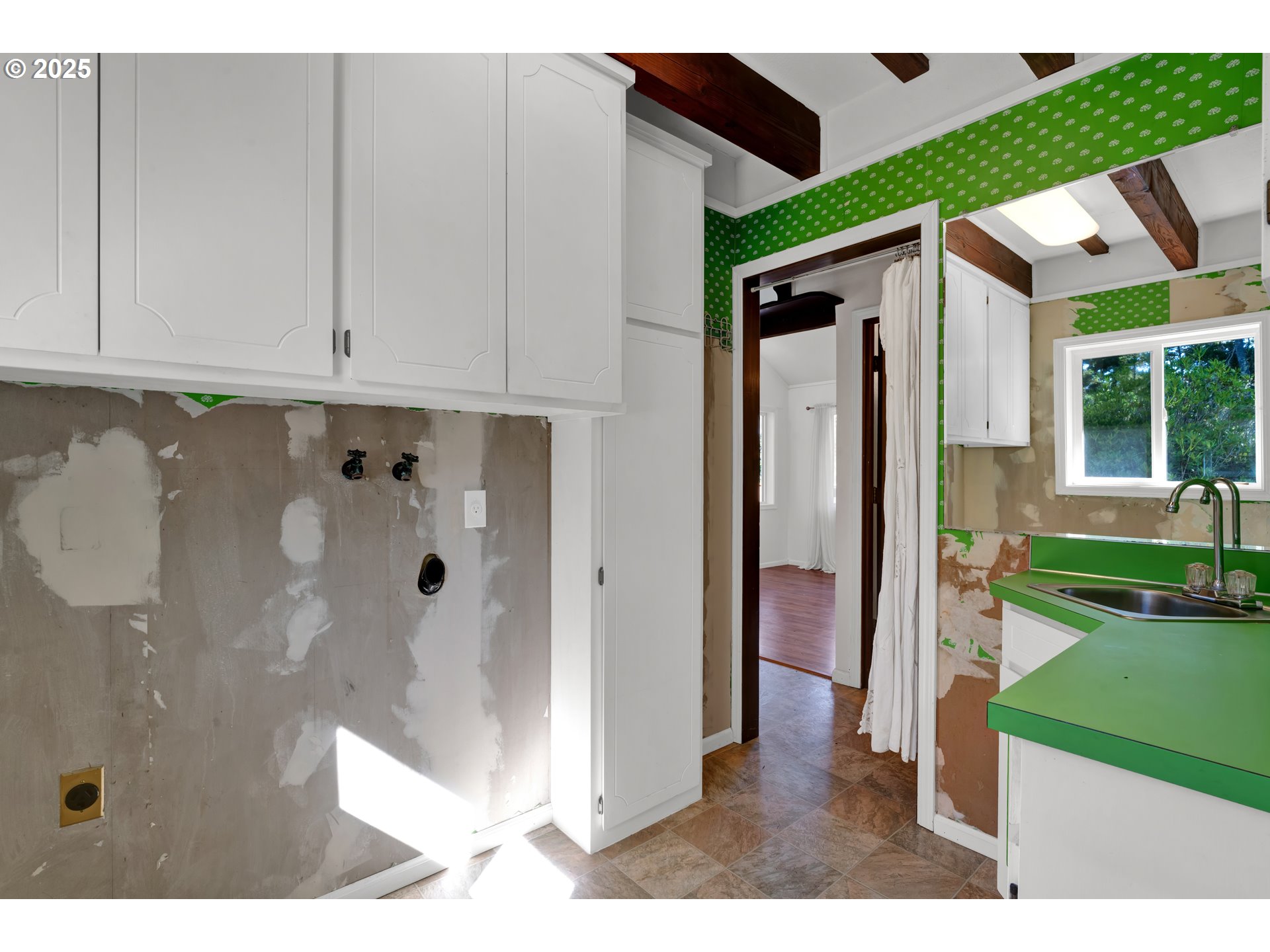 5603 Friendly Acres Road Florence, OR 97439 - Photo 24 of 45 a view of a bathroom with a shower and a sink