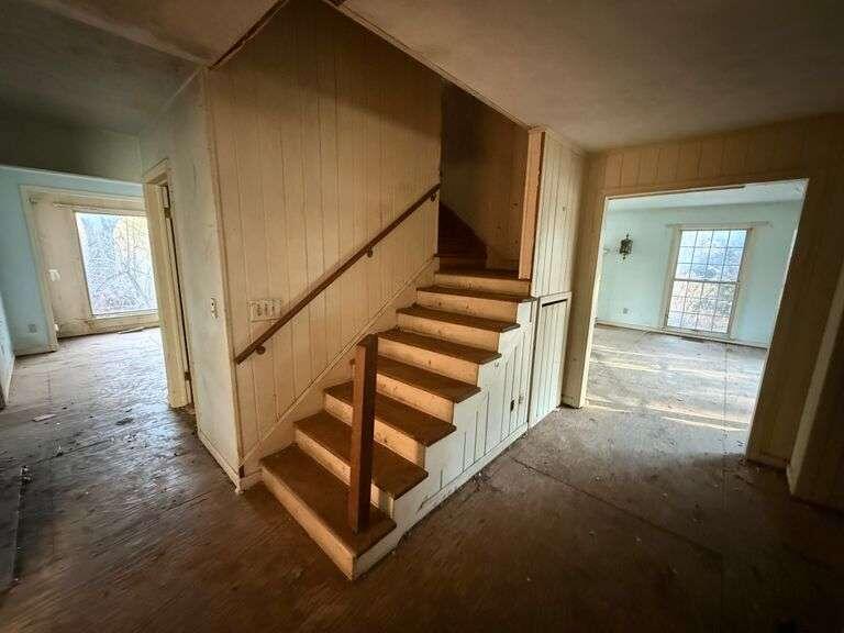 10021 Clay Street Crown Point, IN 46307 - Photo 16 of 30 a view of a hallway with staircase
