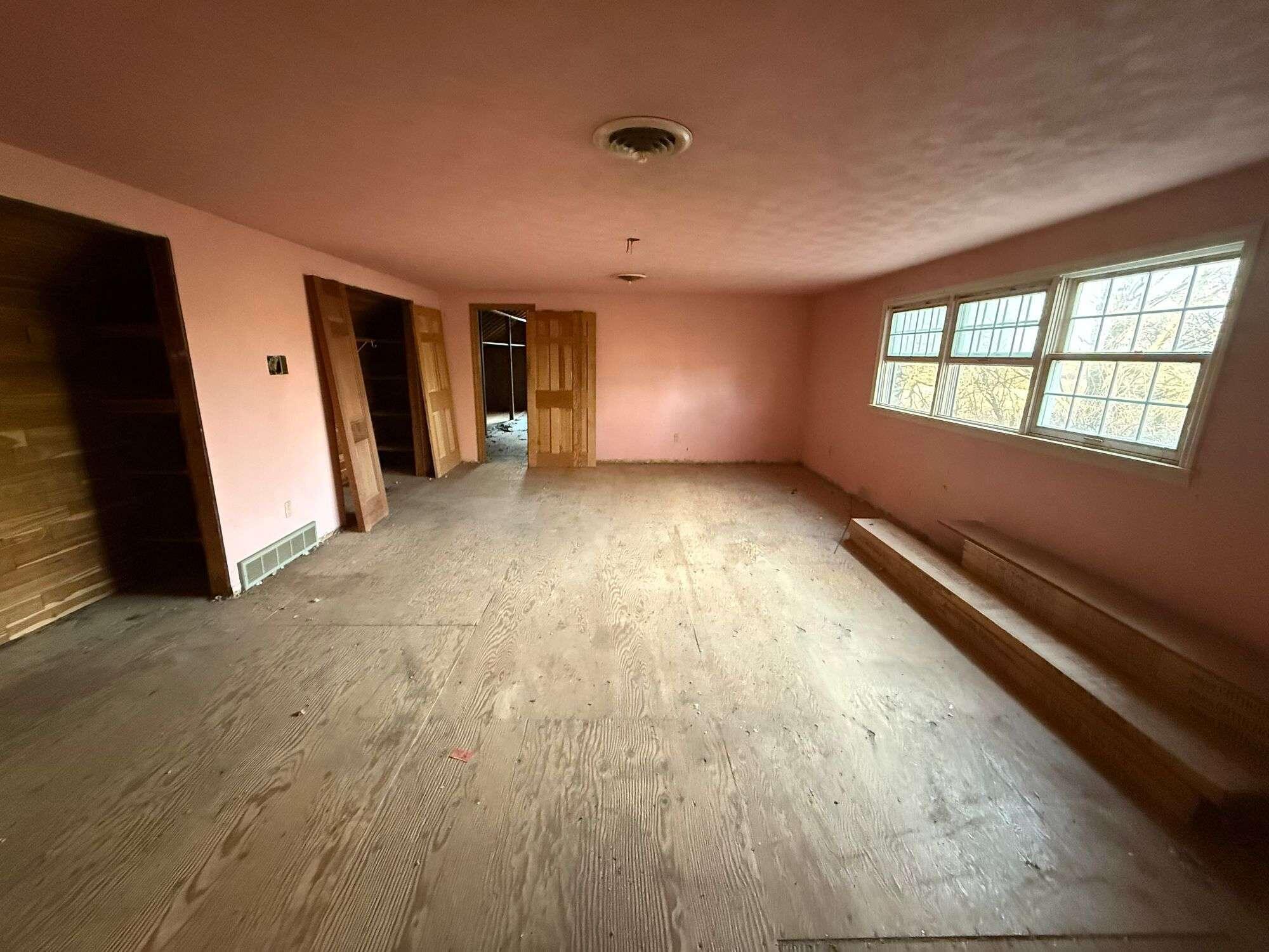 10021 Clay Street Crown Point, IN 46307 - Photo 21 of 30 wooden floor in an empty room with a window