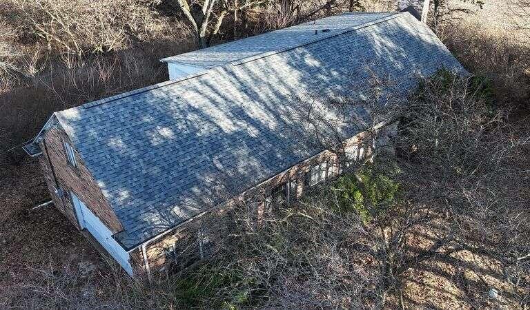 10021 Clay Street Crown Point, IN 46307 - Photo 9 of 30 a view of a backyard with wooden fence