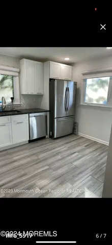 a view of kitchen and utility room