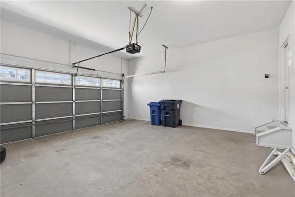 a view of an empty room with empty shelves