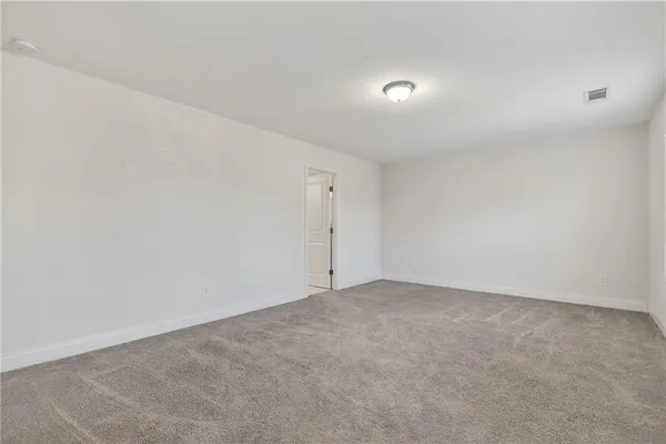 a bathroom with a granite countertop sink mirror and double
