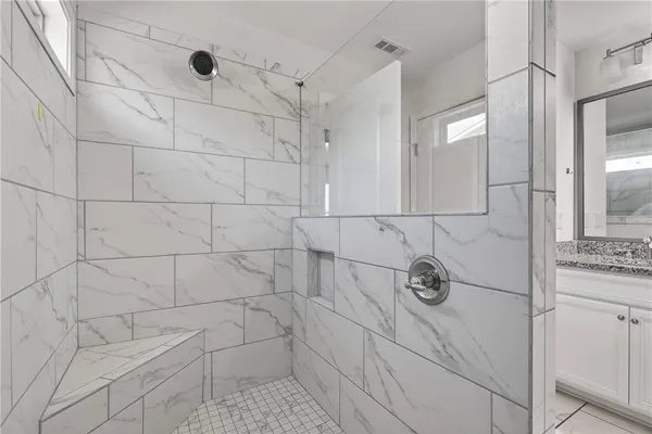 a view of a hallway with staircase