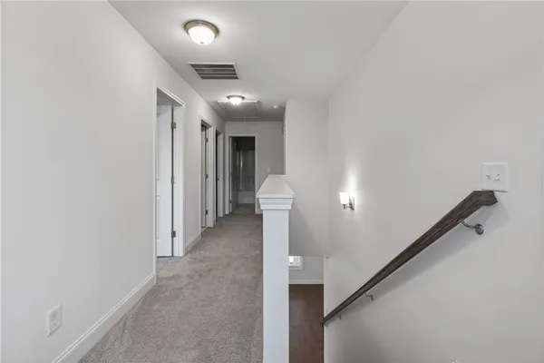 a view of a room with racks on the wall