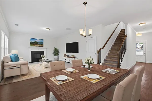 a view of a dining room with furniture