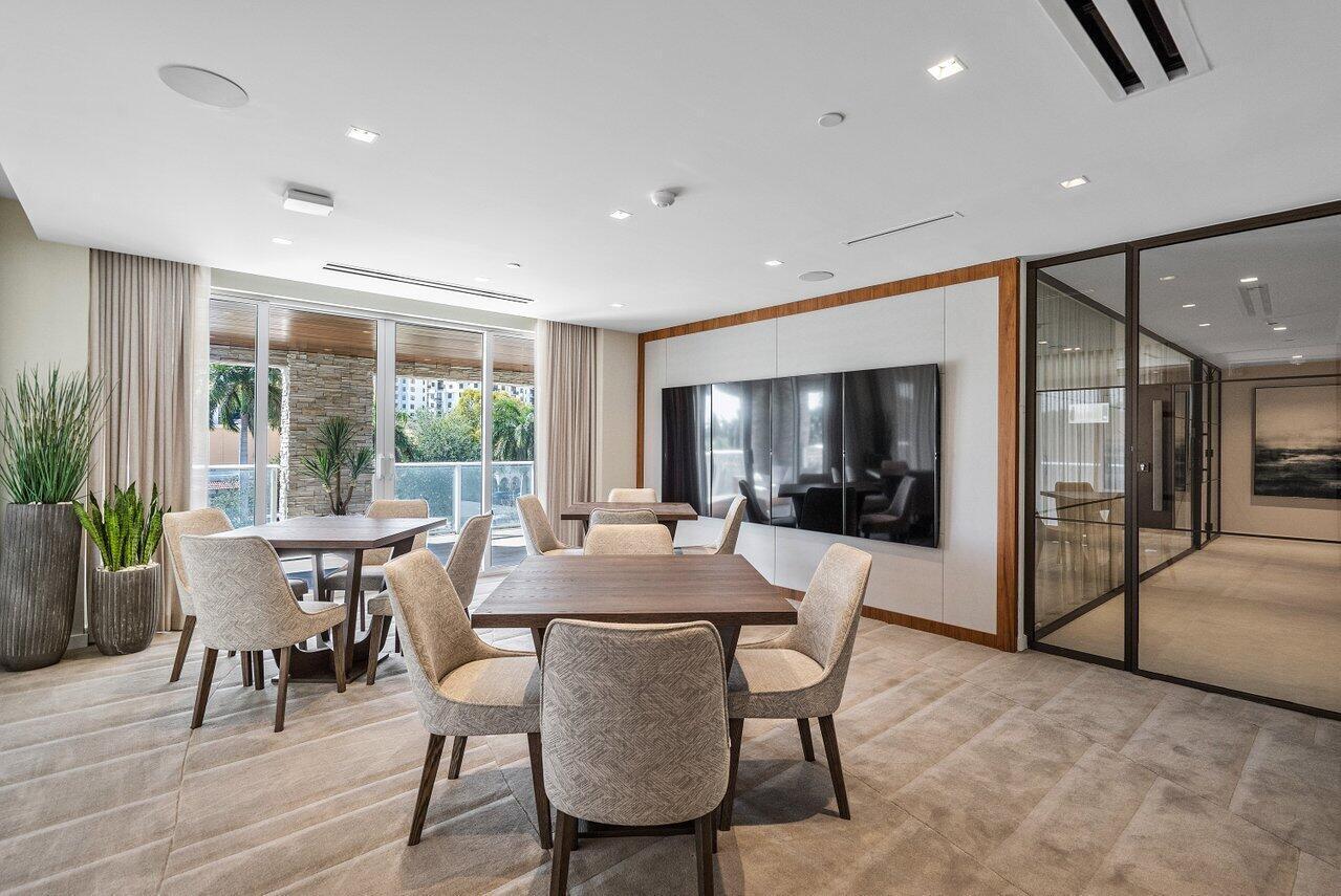 200 Southeast Mizner Boulevard, Unit 211 Boca Raton, FL 33432 - Photo 60 of 67 a view of a dining room with furniture window and outside view