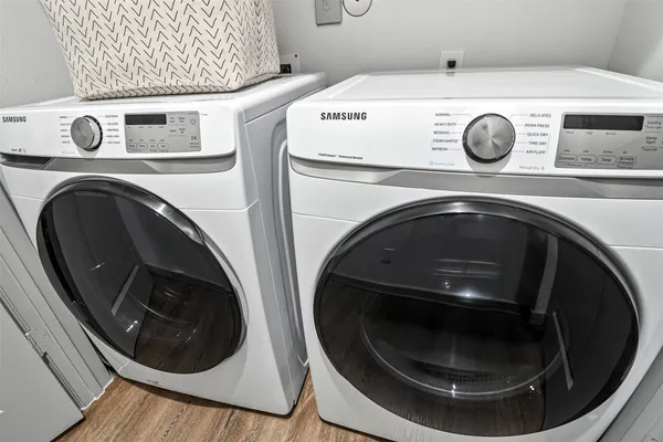 a utility room with dryer and washer