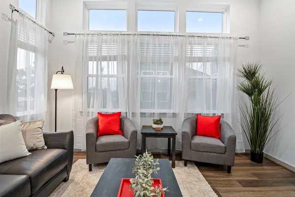 a living room with furniture and a couch