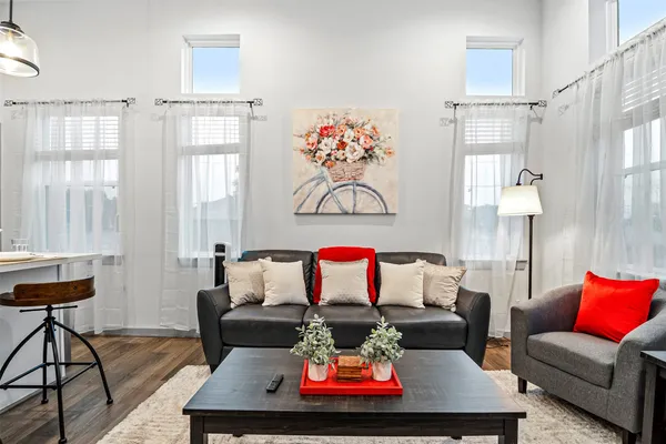 a living room with furniture and a couch