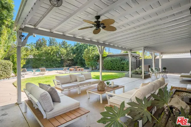 a outdoor space with patio the couches and pool
